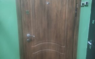 стальная дверь в квартиру с МДФ